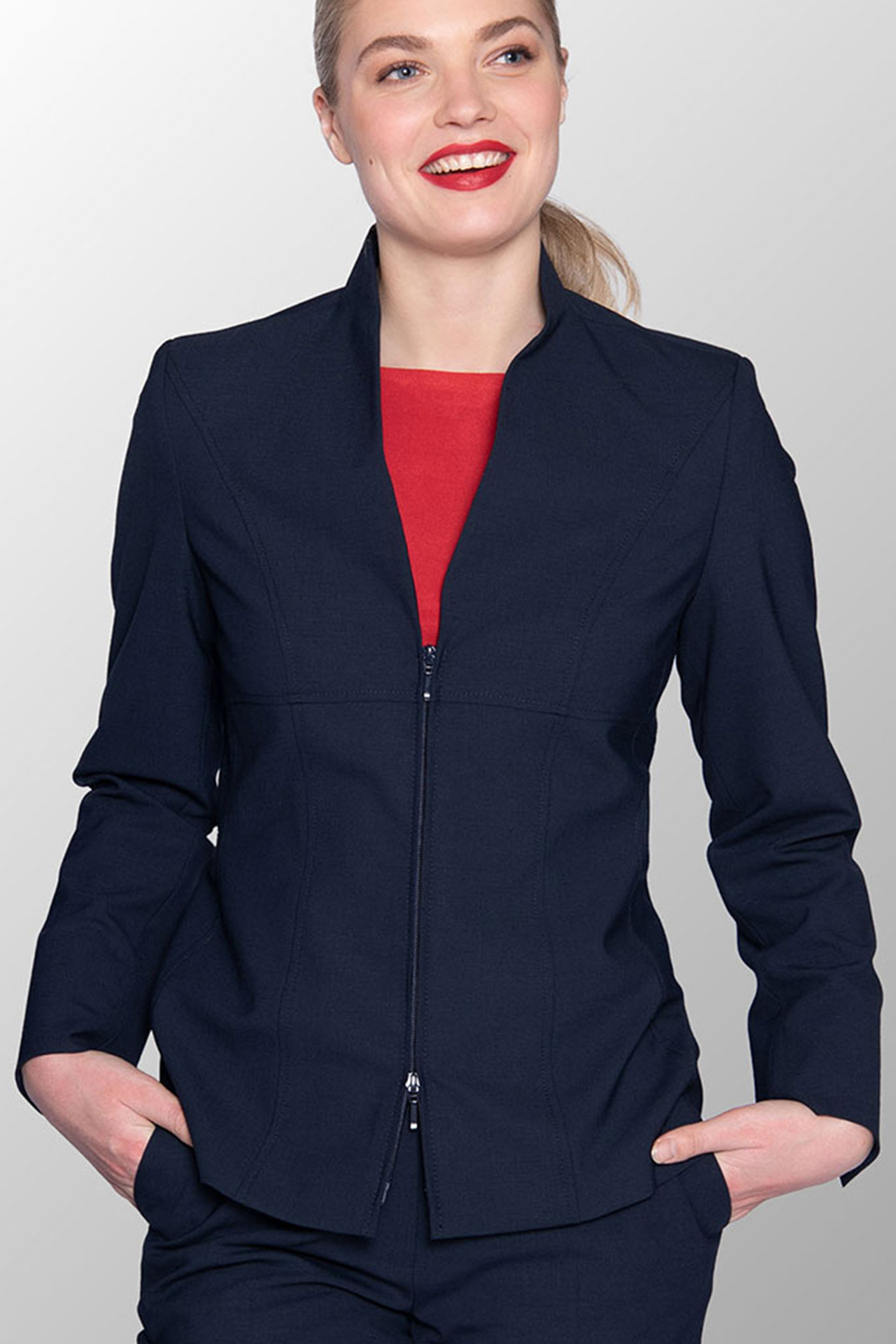 Bedrijfskleding Jaarbeurs Complete outfit: blauwe jack, broek en rood shirt
