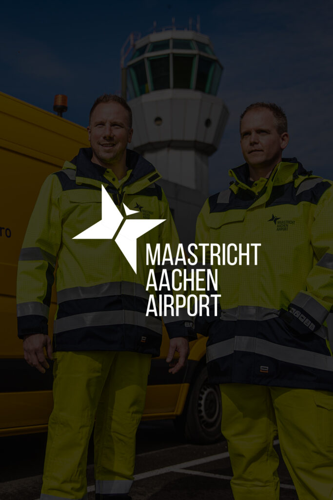 Bedrijfskleding Maastricht Aachen Airport Complete outfit: groen, gele jack en broek
