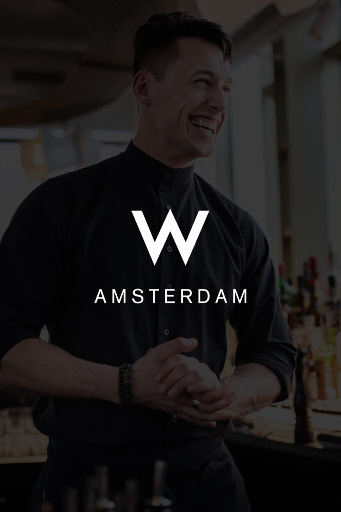 Bedrijfskleding hotel W-Amsterdam Zwarte blouse en schort